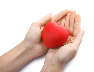 Woman holding red heart on white background, closeup. Cardiology concept
