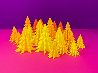 Christmas tree made of yellow craft paper.