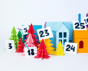 Advent calendar for kids rainbow color. House and Christmas tree paper craft.
