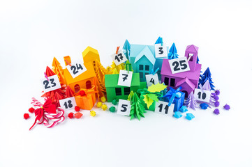 Advent calendar for kids rainbow color. House and Christmas tree paper craft.