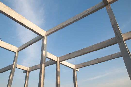 Structure of concrete for building construction on blue sky background. Minimal