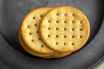 Overhead view of crackers on a plate