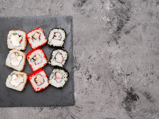 Sushi on stone background.