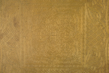 Eastern engraving on bronze, close-up
