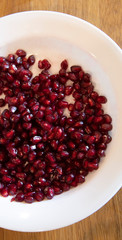 Plate with pomegrante seeds