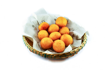 Thai Fried Sweet Potato Balls / general desserts for Snack in basket on white background