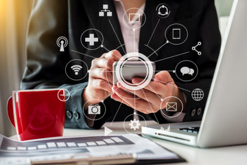 women hand working with laptop computer, tablet and smart phone in modern office with virtual icon diagram at modern office.