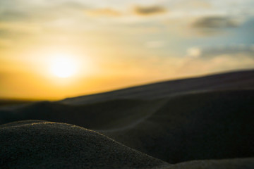 Obraz premium Golden Sunset in the White Sand Dunes of Mui Ne, Vietnam