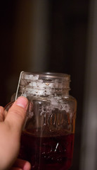 man holding hot tea in hand