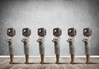 Business women with old TV instead of head.