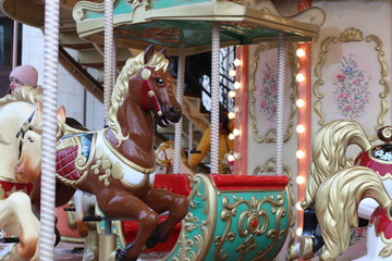 Fototapeta na wymiar carousel with horses. carousel merry go round