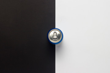 Tin can with a drink on a black-and-white background. minimalism. Concept of day and night,...