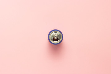 Open can with a drink or empty on a pink background. minimalism. Concept of day and night, caffeine, energy drink, holiday. Flat lay, top view