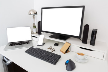 Computer and devices on modern white desk interior 3D rendering