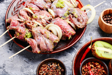 Fresh raw beef meat fillet shish kebab on skewers