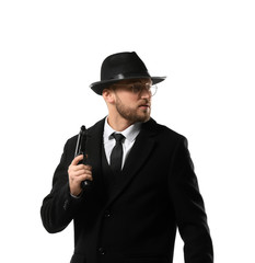 Detective with gun on white background