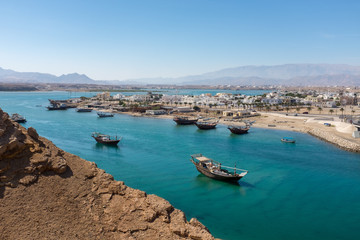 Traditional wooden dhow boats in Sur, Oman