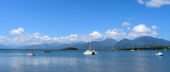 Yachts and catamarans in the marina at anchor. Palawan. Philippines.