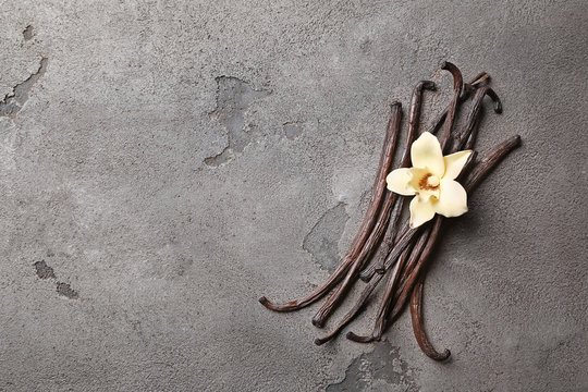 Aromatic vanilla sticks on grey background