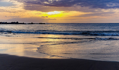 Fototapeta na wymiar Sun Setting on the Atlantic Ocean in Tenerife Canary Island