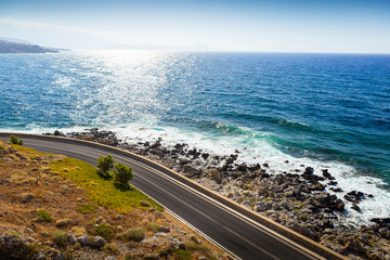 Curved road along the coast at Crete, Greece