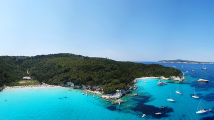 Fototapeta na wymiar Aerial drone panoramic photo of tropical caribbean bay with white sand beach and beautiful turquoise and sapphire clear sea