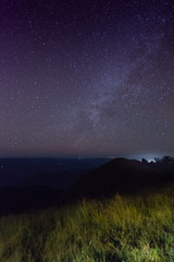 grass in the dark and star in the sky on top of the mountain at mon jong doi, Chiang mai, Thailand