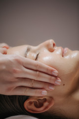 Woman Having Face Massage