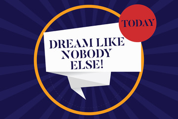Handwriting text Dream Like Nobody Else. Concept meaning Have mote motivation inspiration than others Folded 3D Ribbon Strip inside Circle Loop on Halftone Sunburst photo