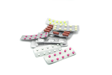 pastillas rosas, verdes, marrones y blancas