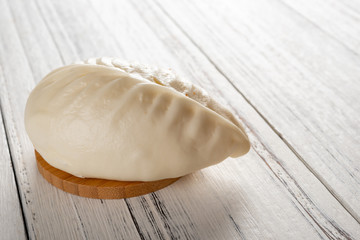traditional Chinese bun on white wood background