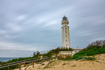 Fototapeta na wymiar Trafalgar lighthouse in a cloudy day, bottom view