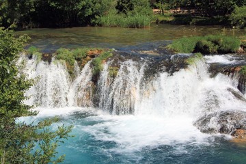 Fototapeta na wymiar close up of Muskovici waterfall, Zrmanja river , Croatia
