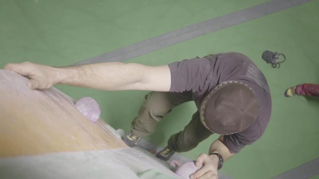 indoor climber climbing bouldering exercise leisure close up hand hold hands