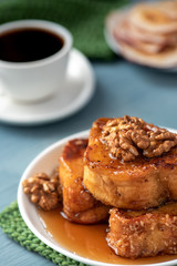 French toast, honey and walnuts. Tasty breakfast.