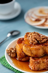 French toast, honey and walnuts. Tasty breakfast.