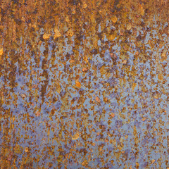 background of metal blue yellow brown rusty plate