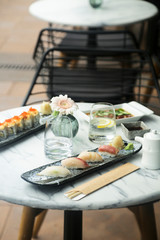 Delicious assorted sushi served outdoors