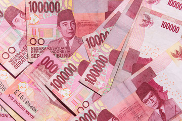Close up of Indonesian money, 100,000 IDR banknotes 