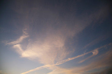 Sky clouds as the best picture. The most abstract background image of the sky. Beautiful sunset. The sun  rays illuminate the clouds.