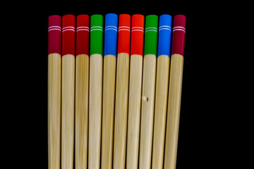 Obraz premium Wooden Chopsticks Isolated on a Black Background