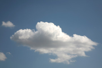 Autumnal weather affects the clouds and sky. The bright colors of heaven are transmitted to the clouds in the sky. Beautiful background on the cloudy image of the air space.