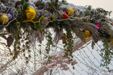 Garland of live tree branches and toys