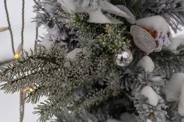 Garland of live tree branches and toys