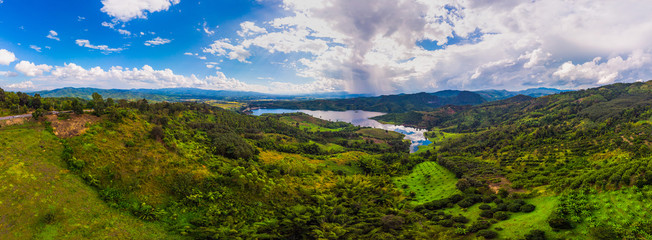 Panorama air view of the rain forest with river.