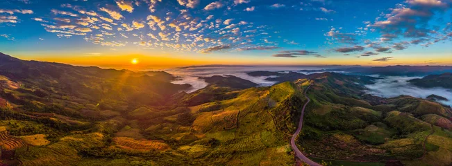 Poster Beautiful panorama are view of mountain rang with hightway road at sunrise time. © kamonrat