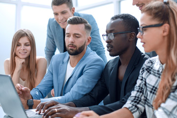 Obraz premium multinational group of young people at the table