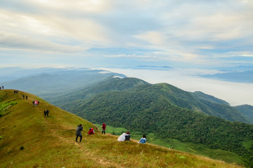 group of tourist on top of a mountain at Doi Mon Jong, a popular mountain near Chiang Mai, Thailand