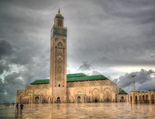 Fototapeta na wymiar Exterior view to Hassan II mosque at cloudy day, Casablanca, Morocco