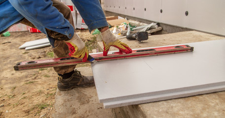 Thermal insulation of walls in the house foam